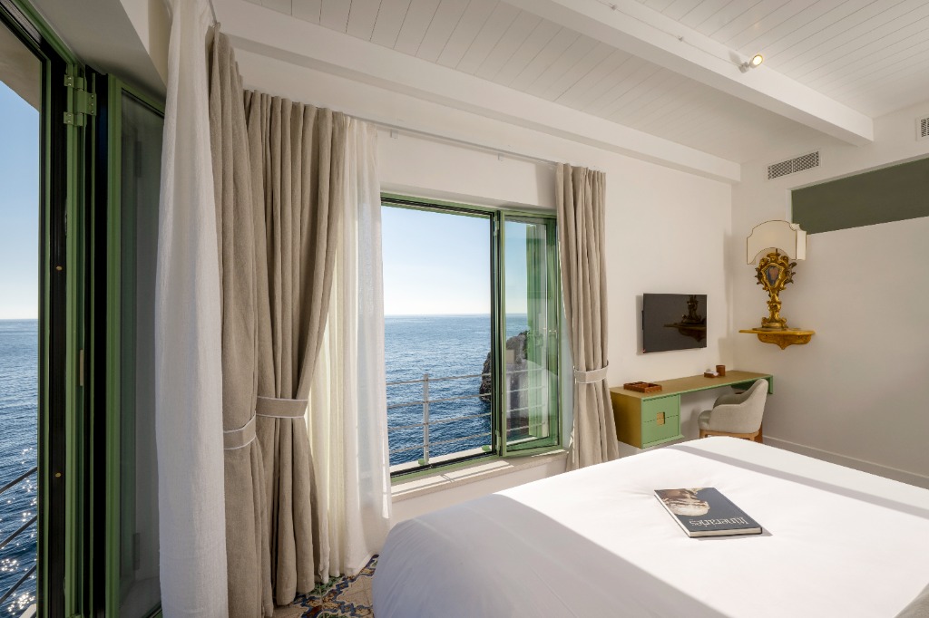 Newly uploaded ultra-luxury Caribbean beachfront villa guest master bedroom suite with ocean views