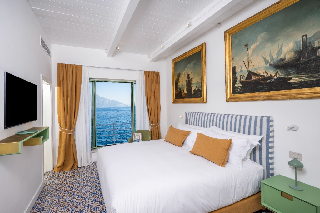 Newly uploaded ultra-luxury beachfront villa bedroom interior with panoramic sea views