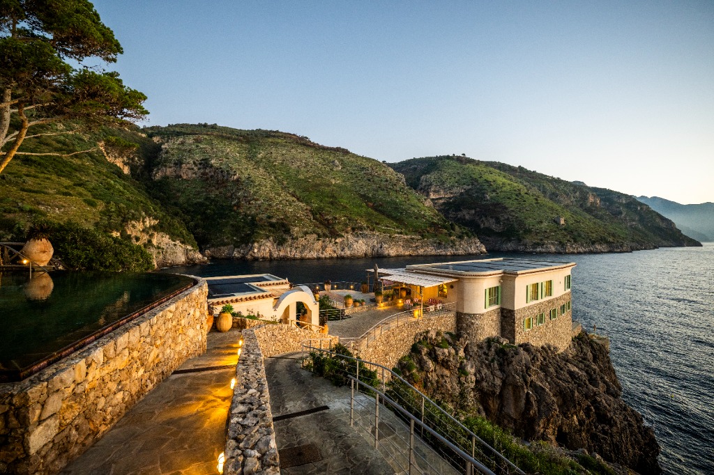 Newly uploaded private island villa cliffside pathways beautifully lit up at sunset